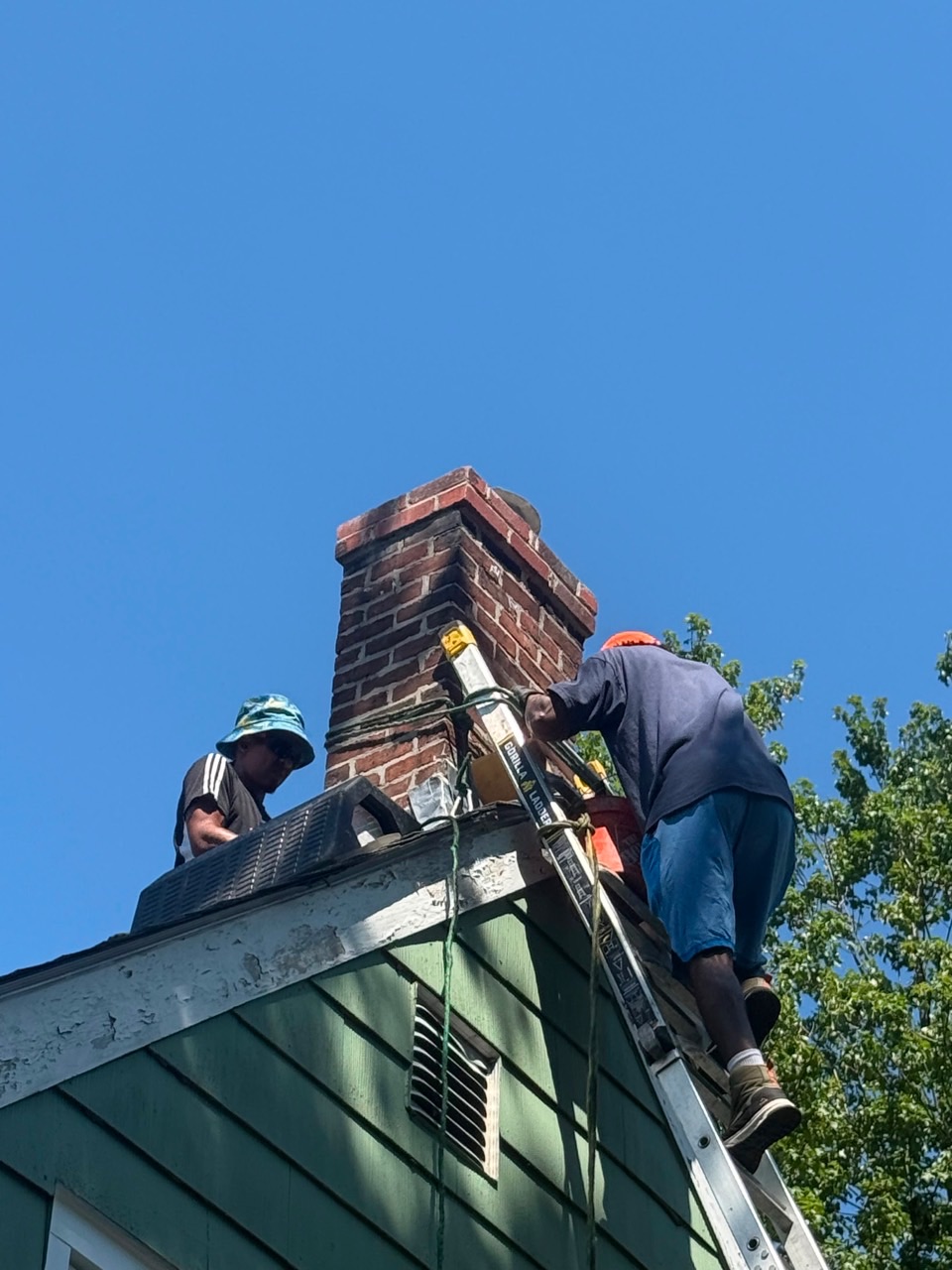 Chimney flashing repair team working in Braintree MA