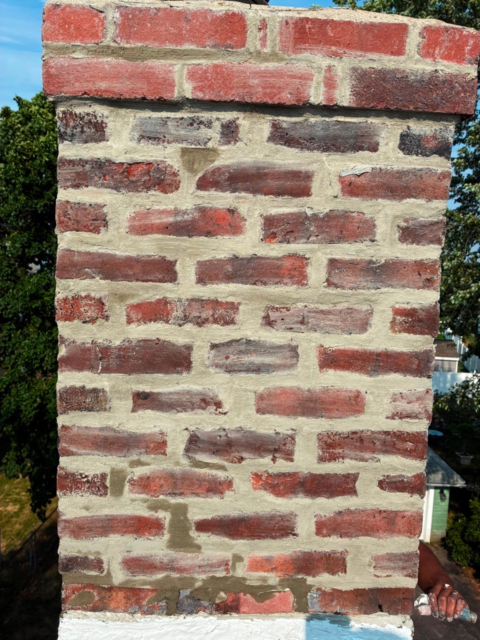 Chimney masonry after full repointing in Braintree MA