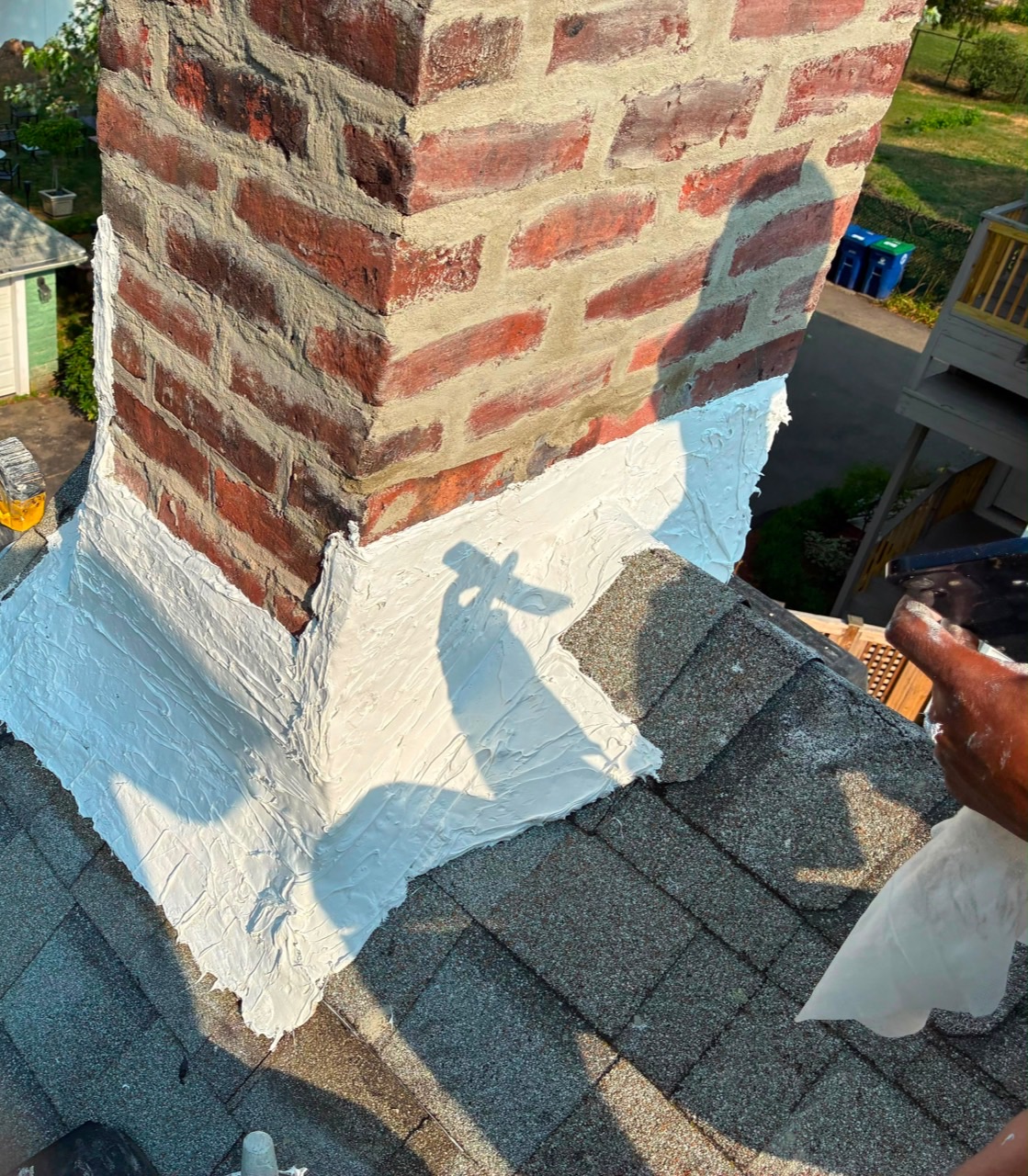Sealed chimney flashing and repaired shingles in Braintree MA