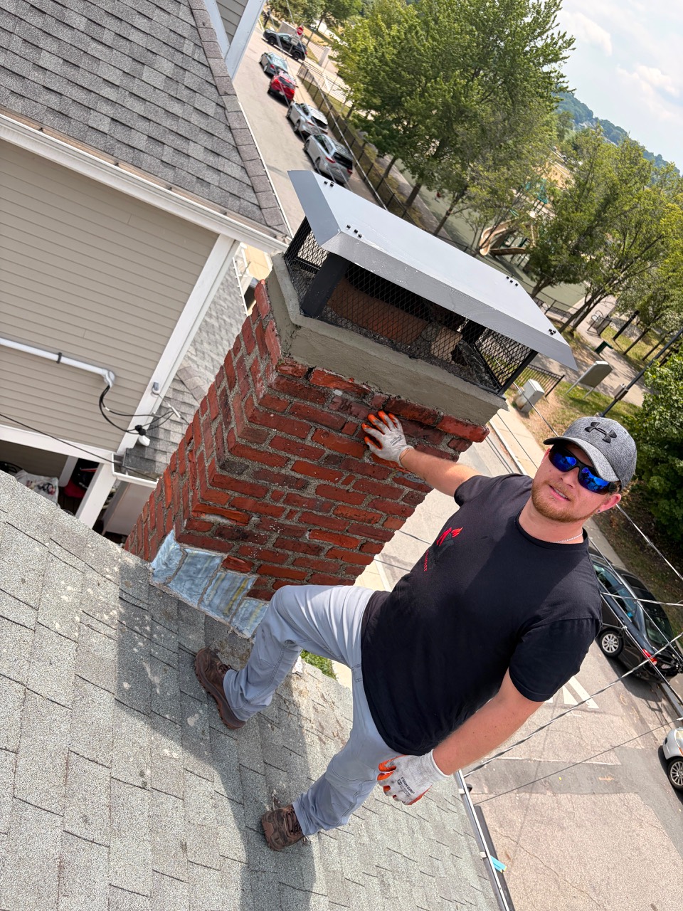 Secured custom chimney cap after installation in Boston MA