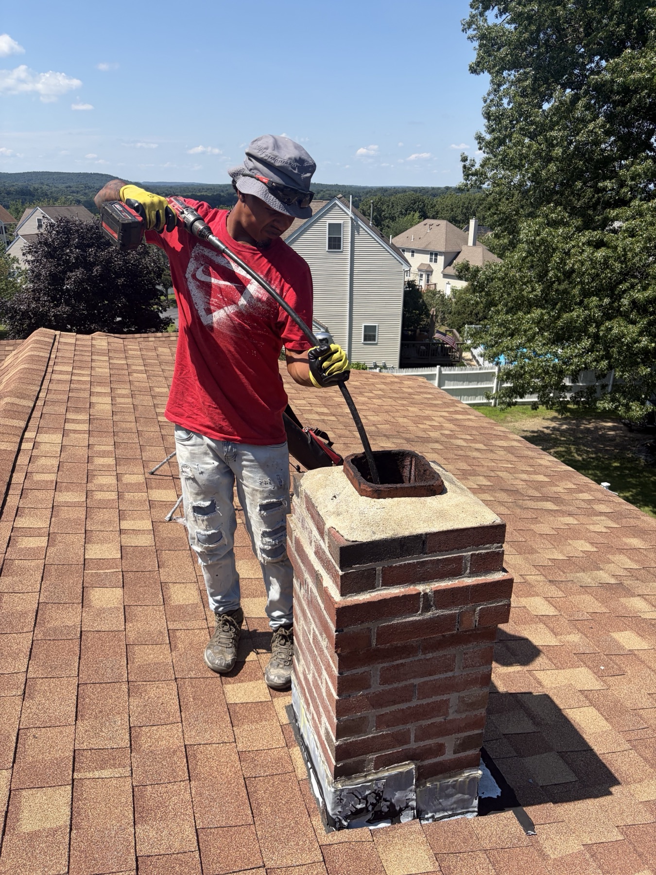 Chimney cleaning before liner installation in Methuen MA