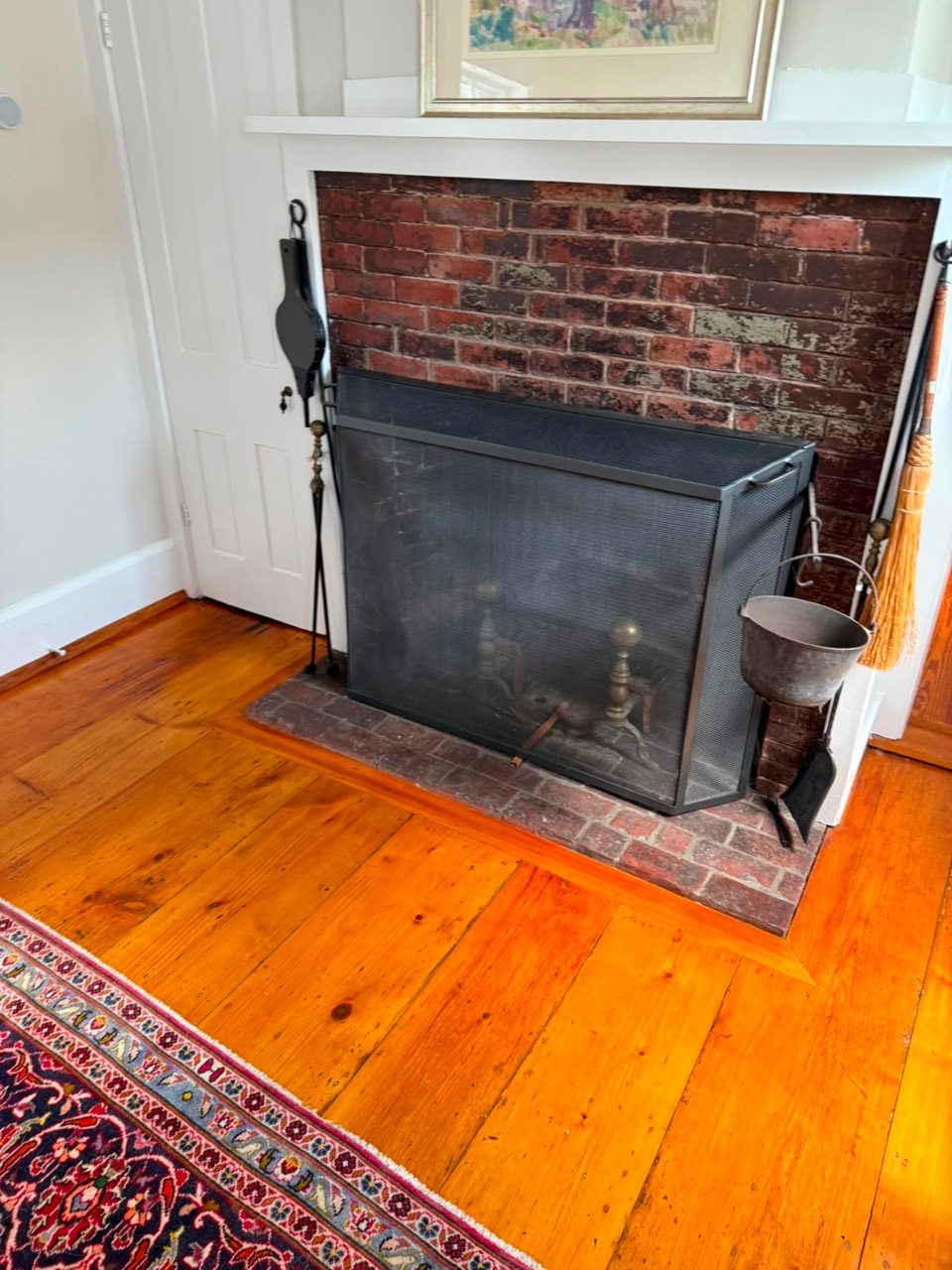Finished fireplace after chimney sweep in Rockport MA